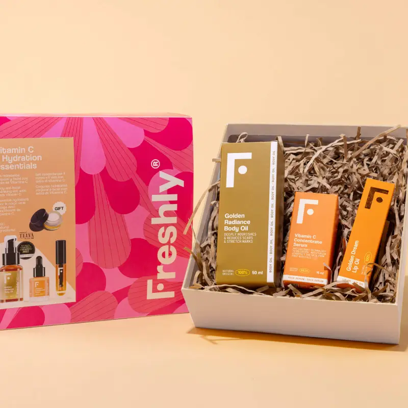 Corpo Cofanetto Vitamin C & Hydration Essentials - Gloss, Siero viso illuminante, Balsamo labbra, Olio per smagliature, Cofanetto vis miniatura 3