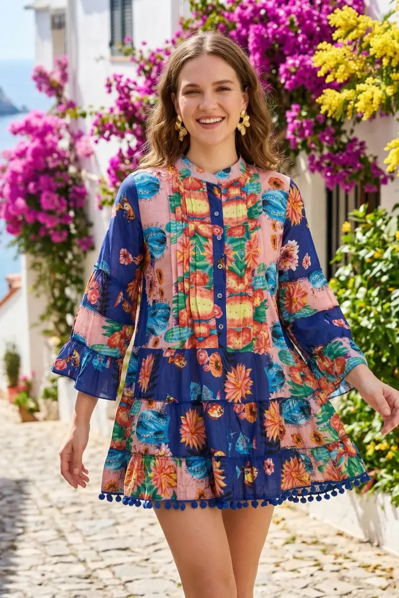 ABITO CORTO CON MANICHE A CAMPANA | Colore Riviera |