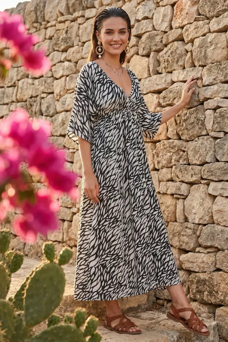 ABITO LUNGO CON SPACCO | Colore Zebrato |