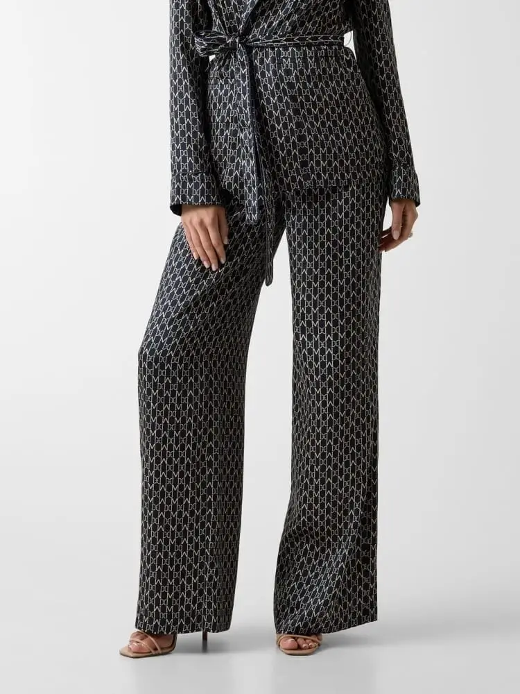 pantaloni con stampa logo marciano all over