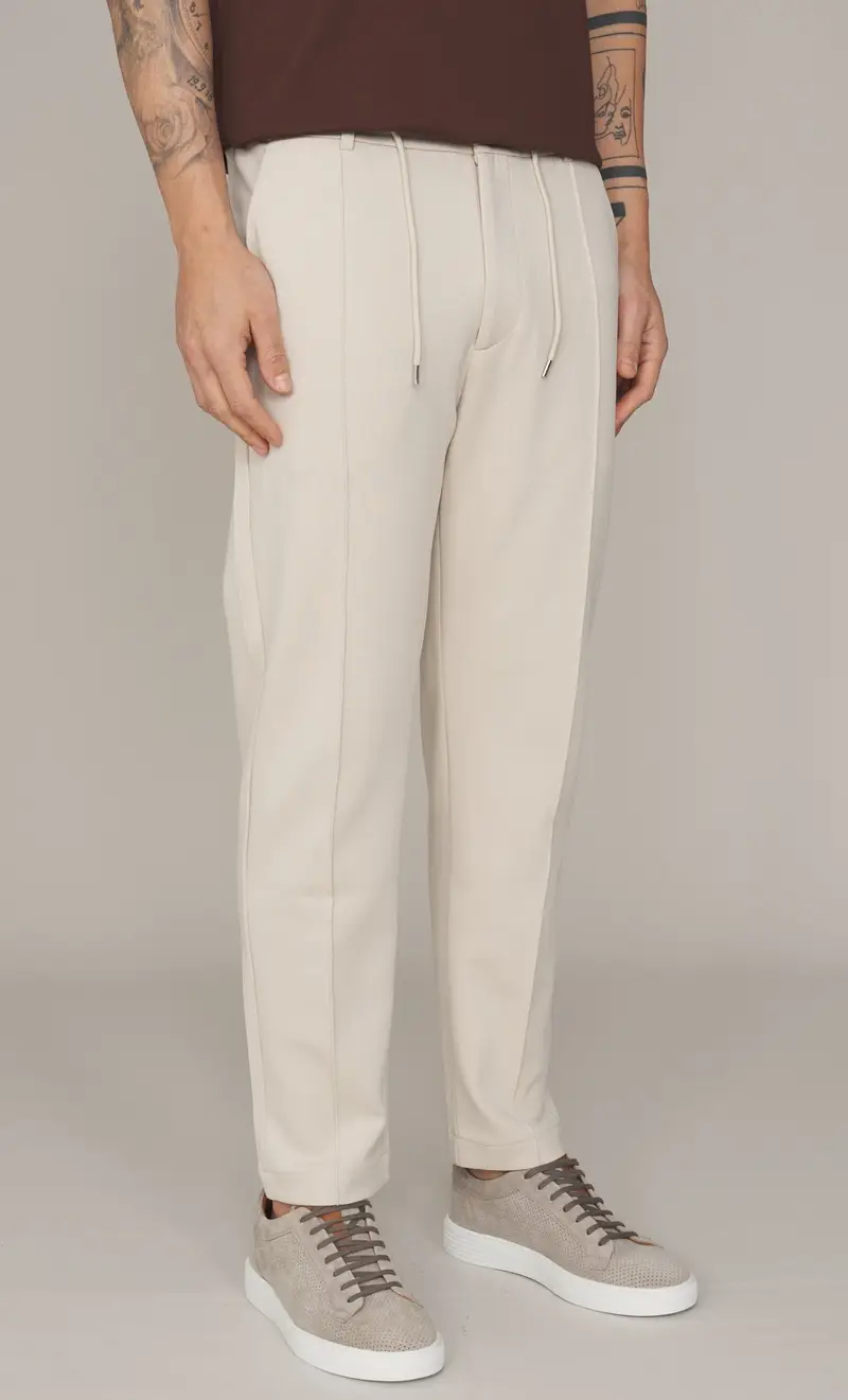 Pantalone hèskimo in punto milano con vita elasticizzata, colore beige