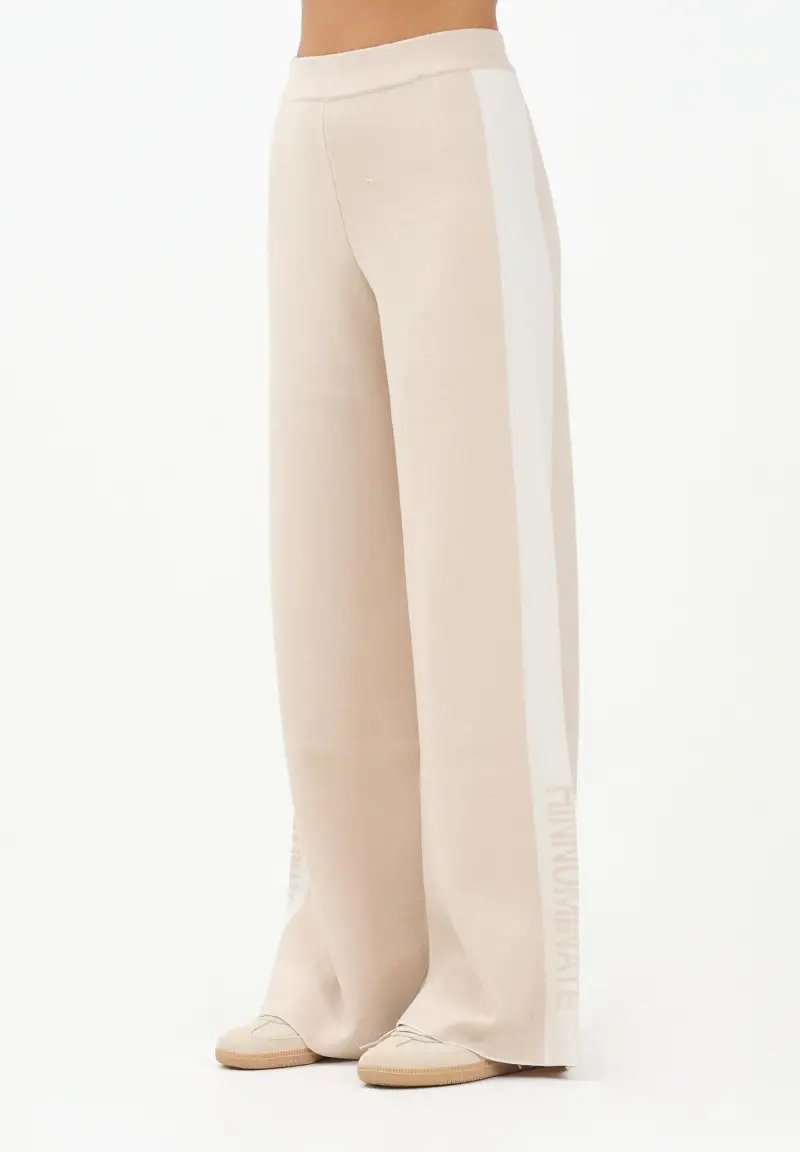Pantalone in maglia beige da donna con banda laterale logata