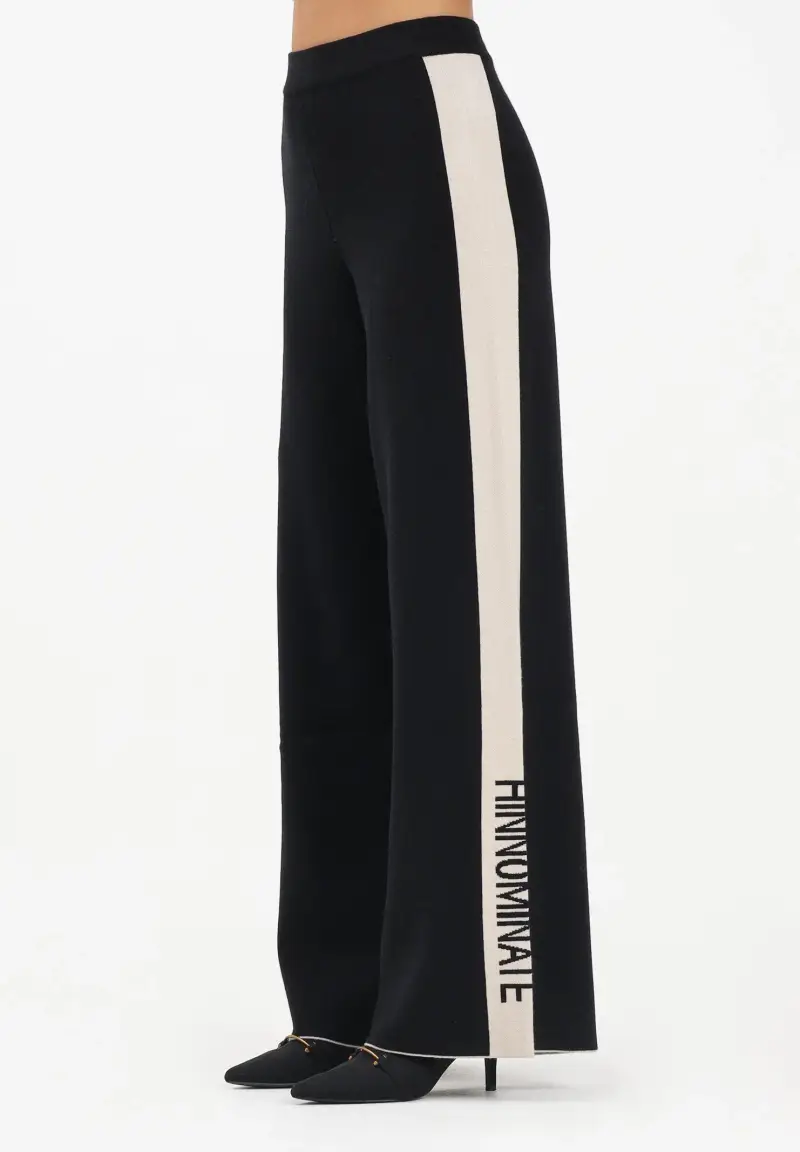 Pantalone in maglia nero da donna con banda laterale logata