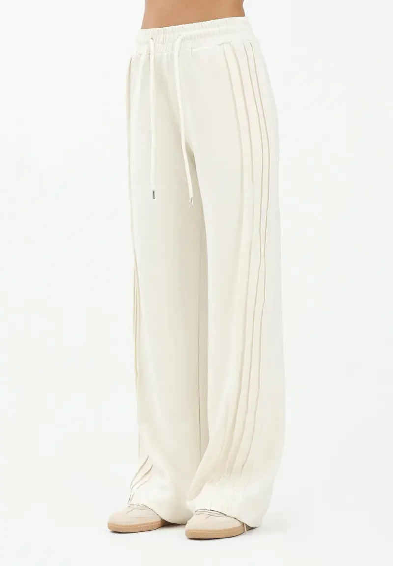 Pantalone sportivo panna da donna con nervature laterali