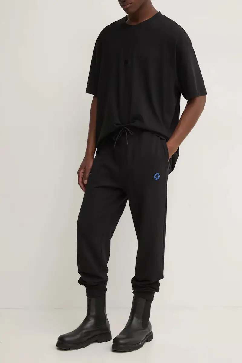 pantaloni della tuta di cotone colore nero 50522360