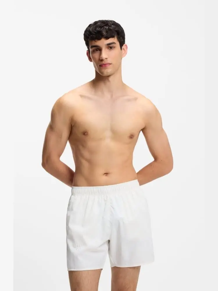 boxer mare bianco ad asciugatura rapida con loghi in rilievo