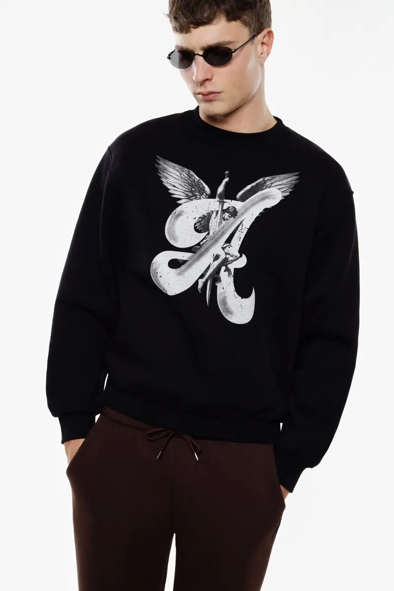 Felpa girocollo stampa grafica ali oversize Nero