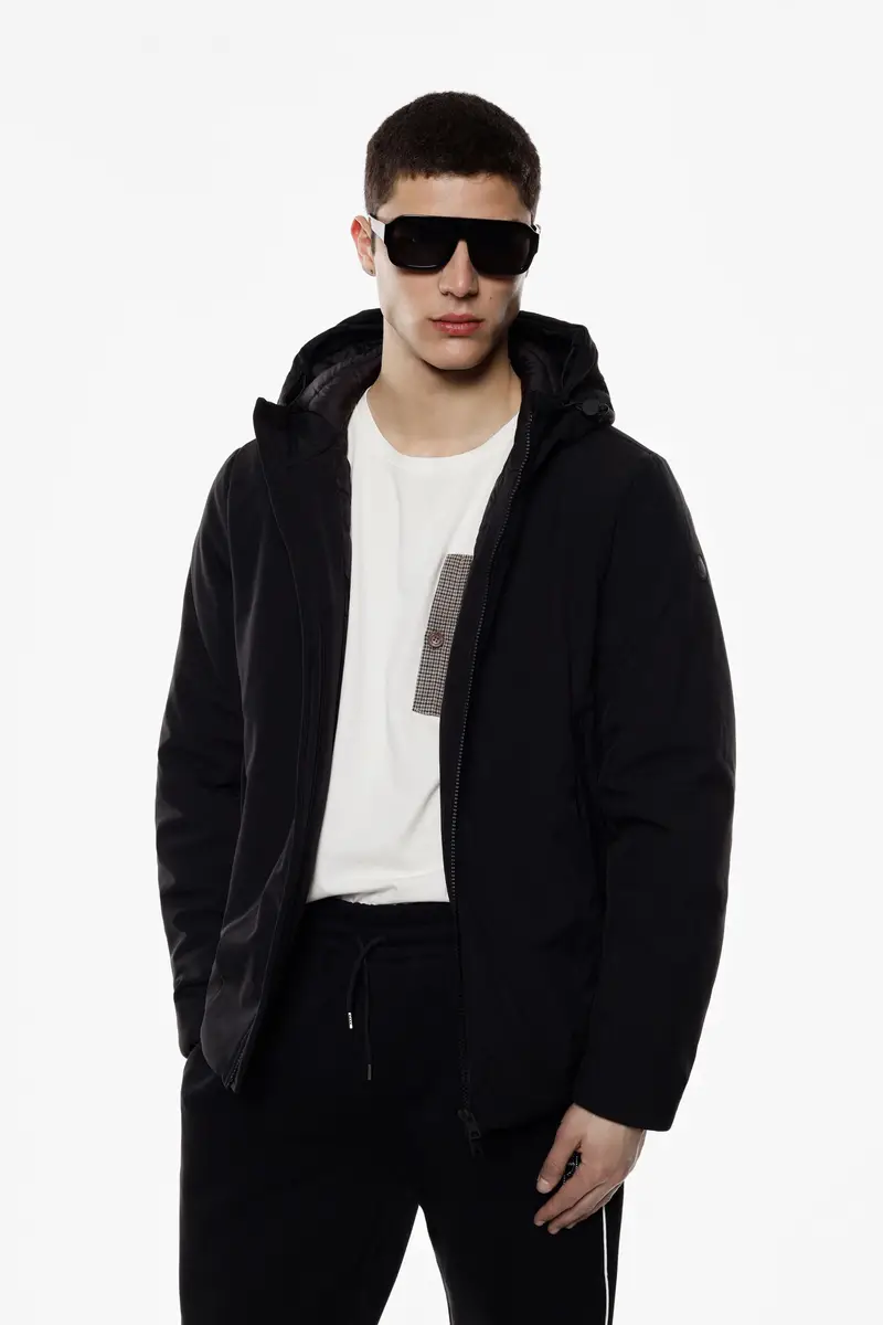 Giacca trapuntata con cappuccio e zip frontale Nero