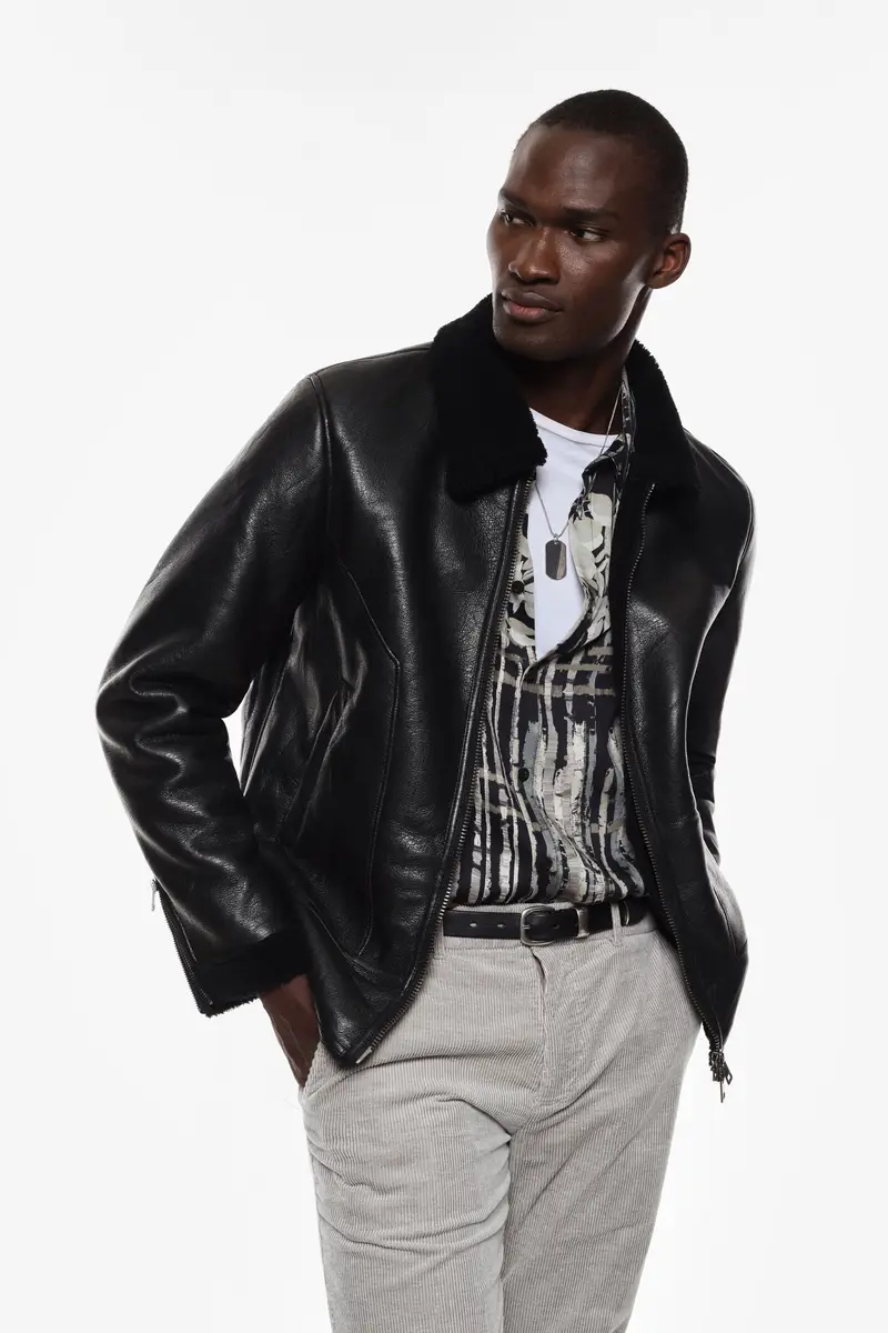 Giubbotto in similpelle con colletto e zip Nero