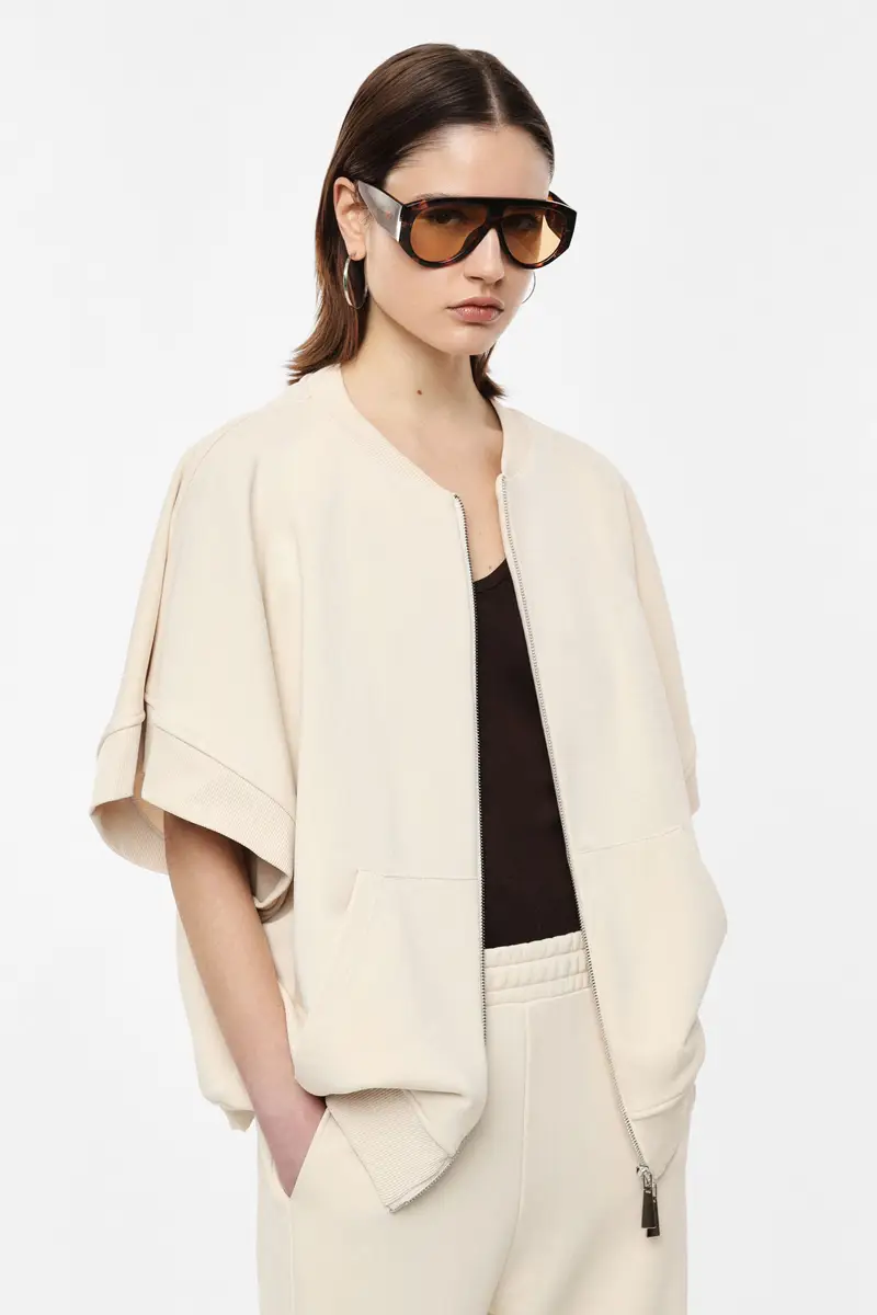 T-shirt zip front maniche corte tasca a marsupio Ice