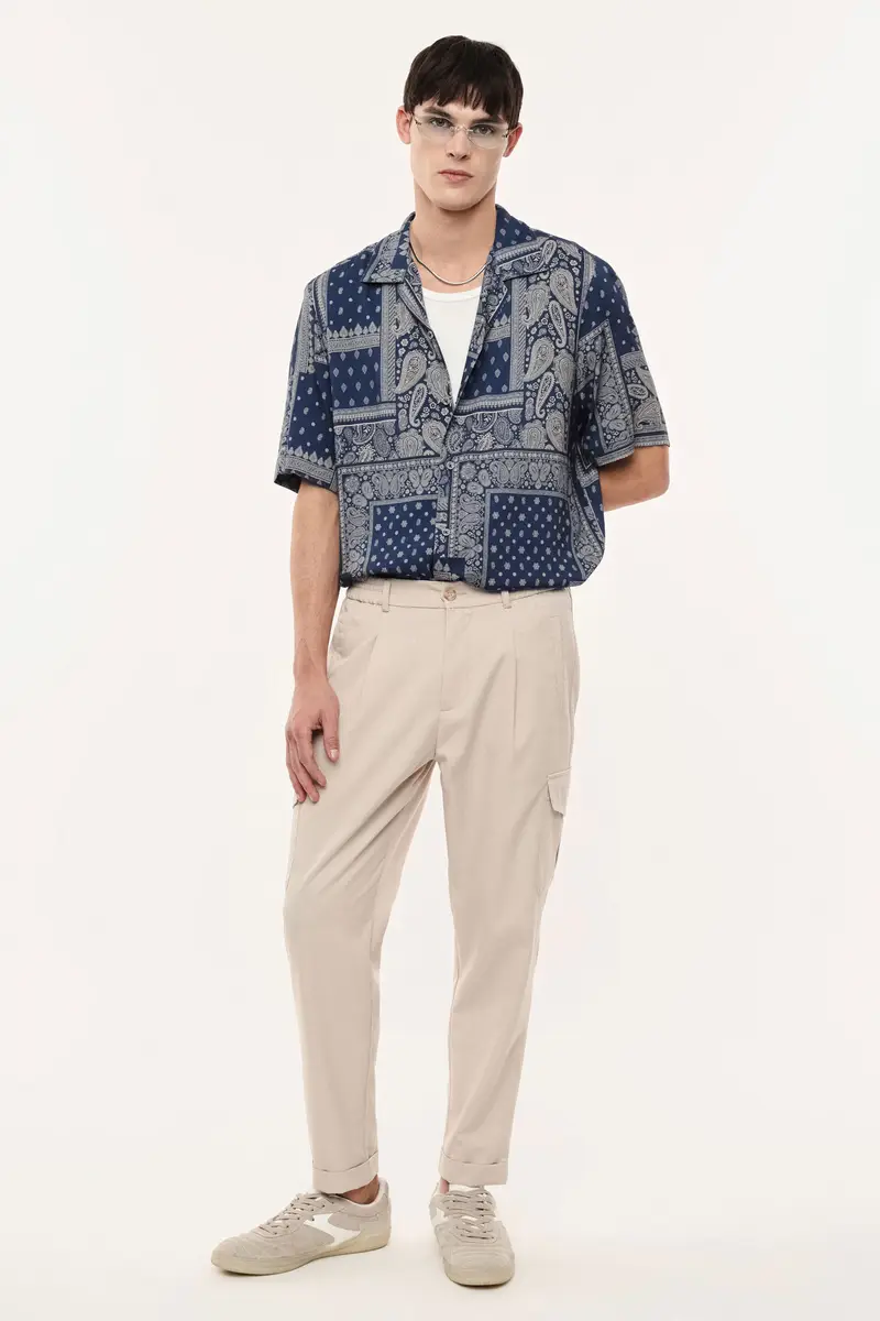 Trousers baggy-fit con tasche cargo laterali Beige miniatura 2