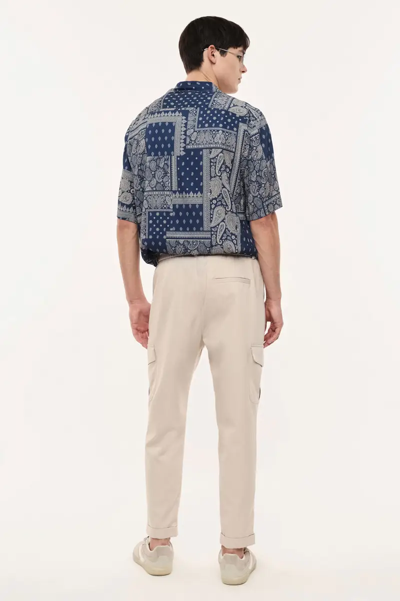 Trousers baggy-fit con tasche cargo laterali Beige miniatura 3