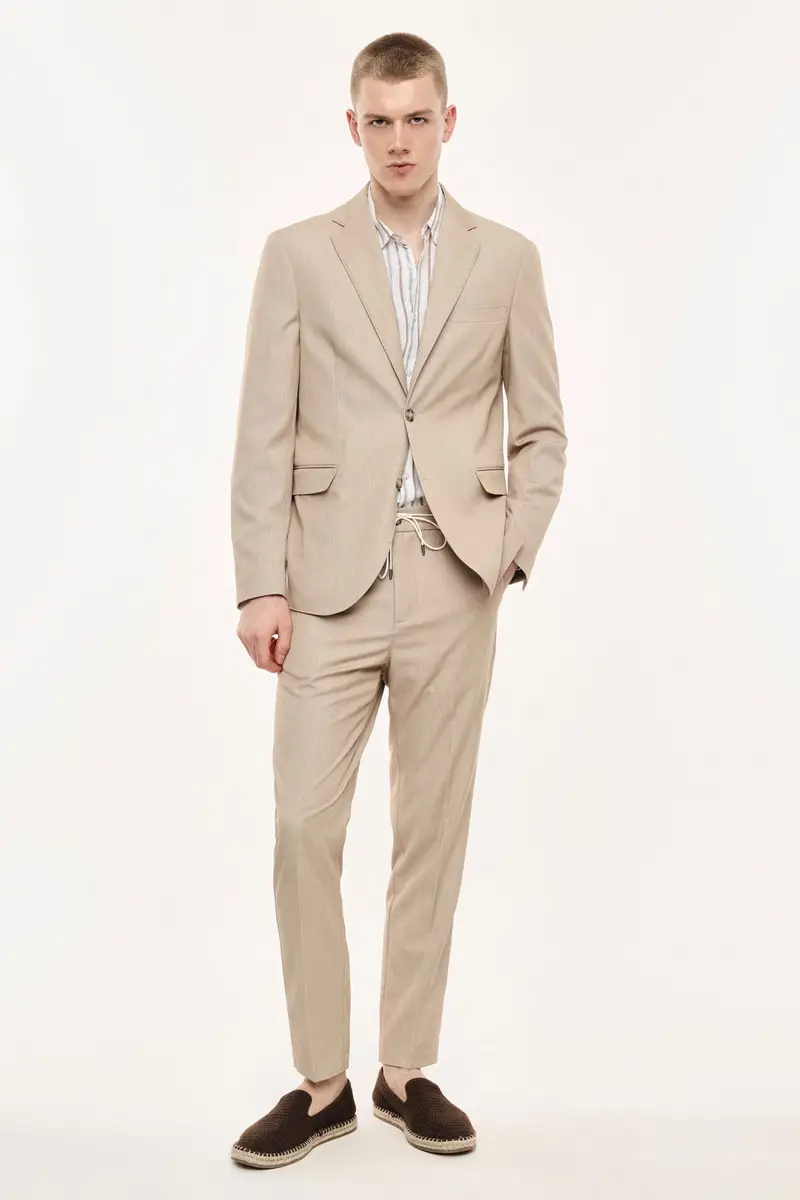 Trousers chino-fit con coulisse e piega frontale Beige miniatura 2