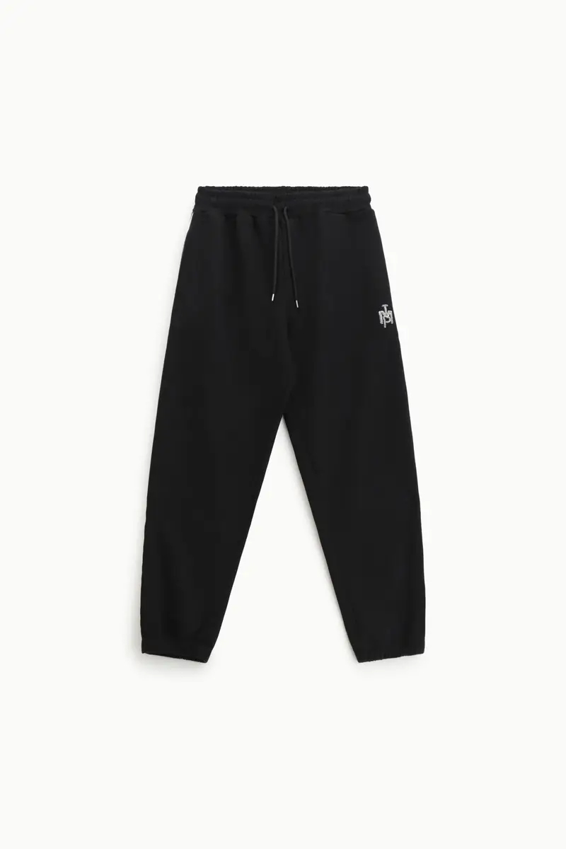 Trousers jogging fit con dettagli piping laterali Nero
