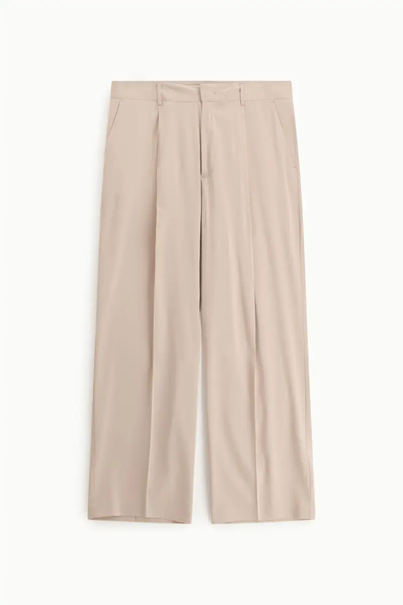 Trousers regular-fit con pince e tasche laterali Skin