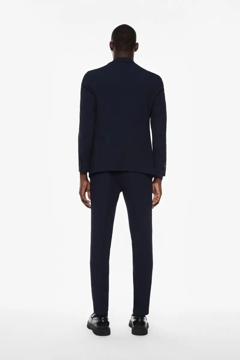 Trousers slim-fit con piega frontale e tasche laterali Blu miniatura 4