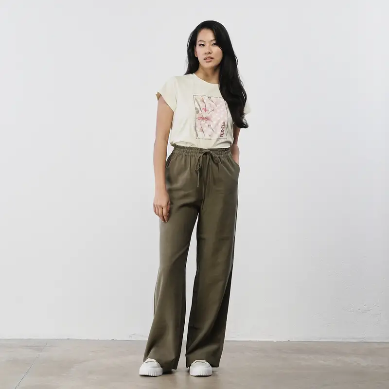 Pantaloni verdi ampi da donna con coulisse in vita