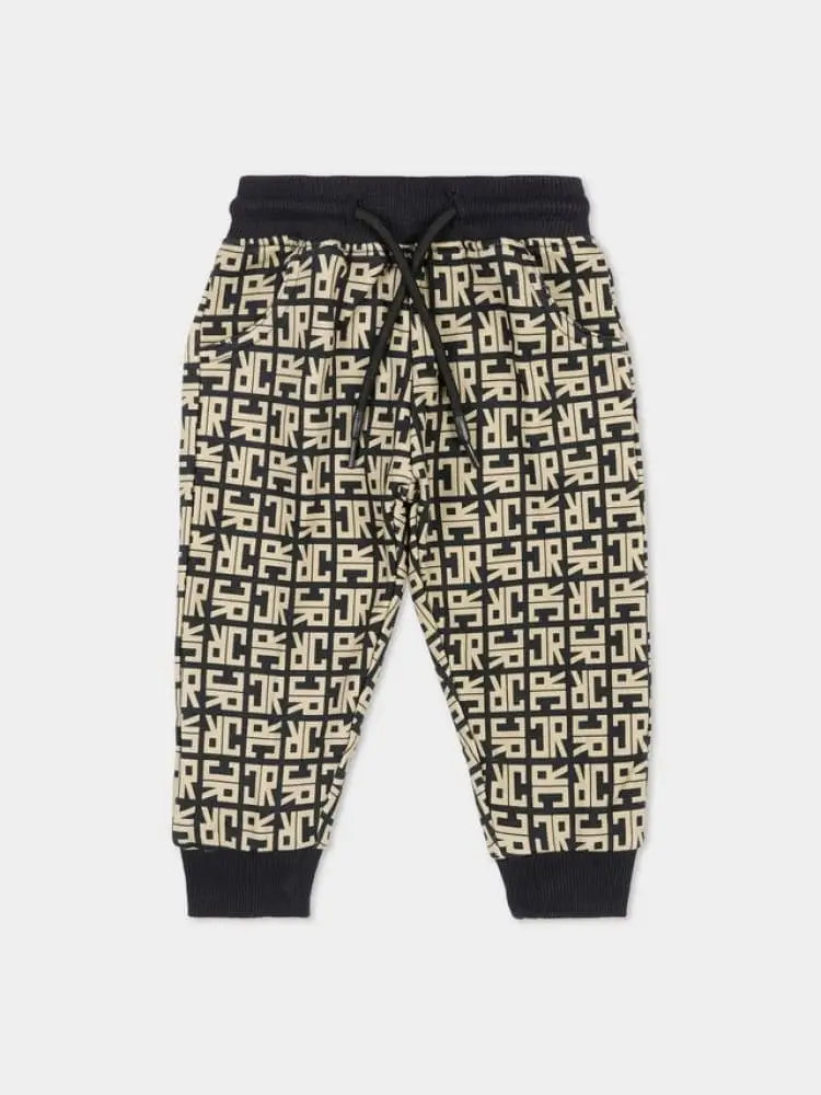 pantalone beige con pattern logato