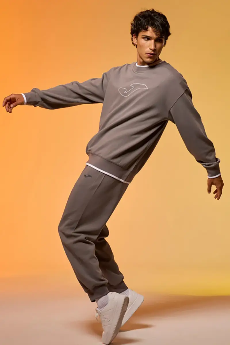 Pantaloni jogger grigi con fascia elastica e logo in silicone JOMA Step Long Pants [GRIGIO] miniatura 3