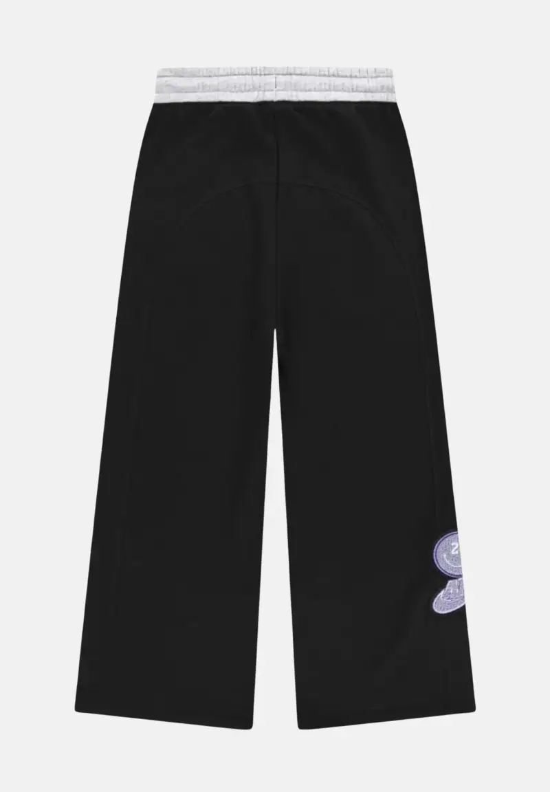 Pantalone sportivo nero da bambina con patch miniatura 2
