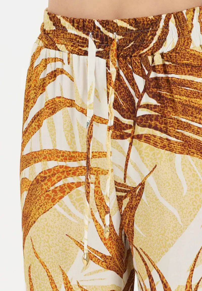 Pantalone elegante beige da donna con stampa di foglie miniatura 3