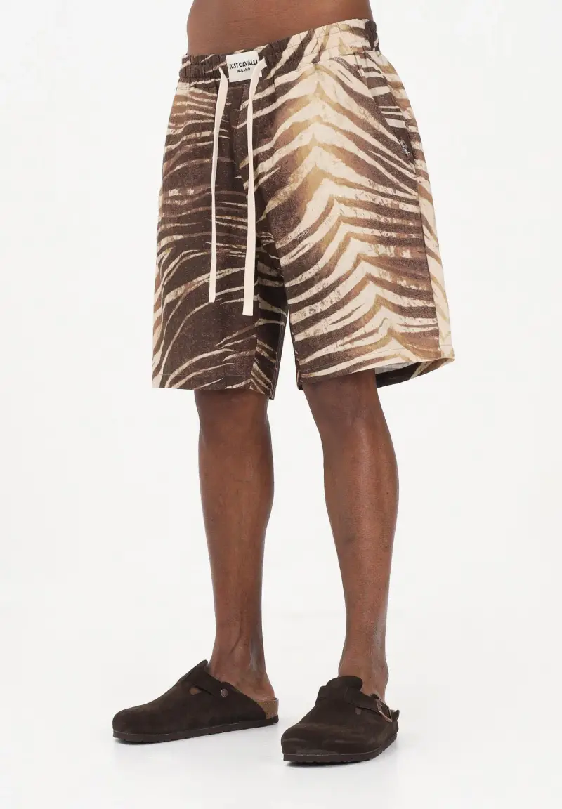 Shorts beige da uomo con stampa animalier effetto tigre