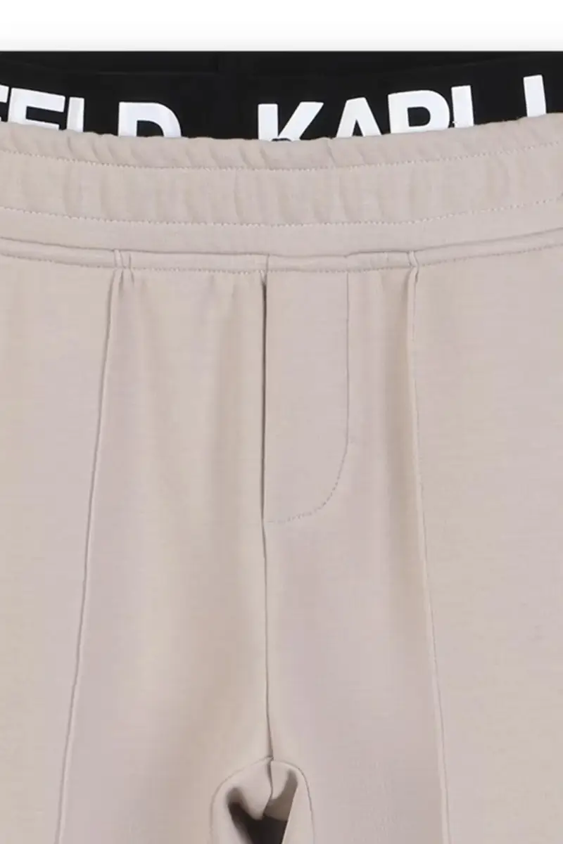 pantaloni tuta bambino/a colore beige con applicazione Z30633 miniatura 4
