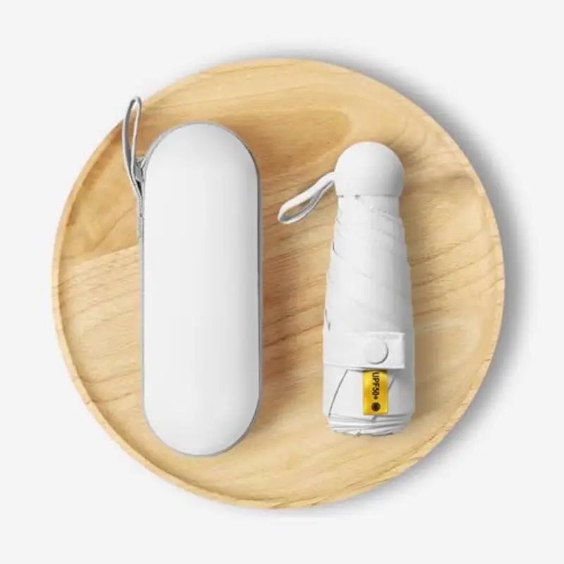 Kiuiom Pieghevole Ombrello da Viaggio, Portatile Compatto Ombrello, Umbrella Pioggia Antivento Anti UV, Mini Ombrello da Tasca 6 Costole Mini Ombrello Ultraleggero per Donne E Uomini(Bianco) miniatura 2