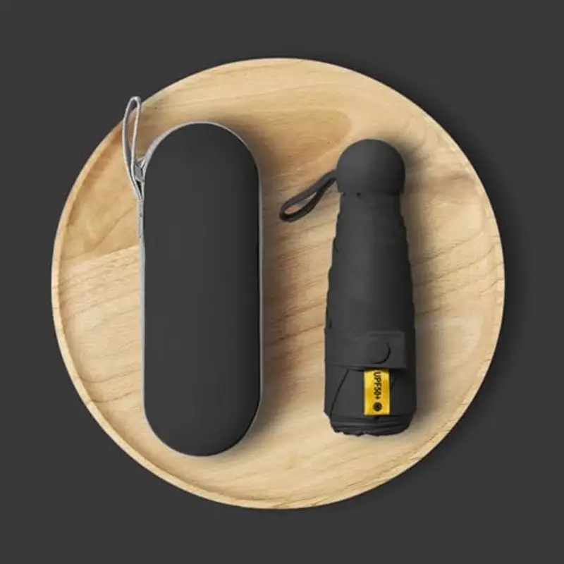 Kiuiom Pieghevole Ombrello da Viaggio, Portatile Compatto Ombrello, Umbrella Pioggia Antivento Anti UV, Mini Ombrello da Tasca 6 Costole Mini Ombrello Ultraleggero per Donne Uomini(Nero) miniatura 3