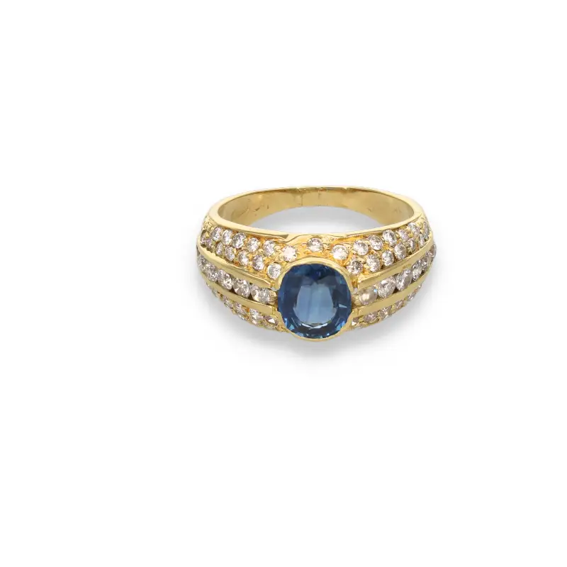 Anello fascia in oro giallo 18kt zaffiro e diamanti