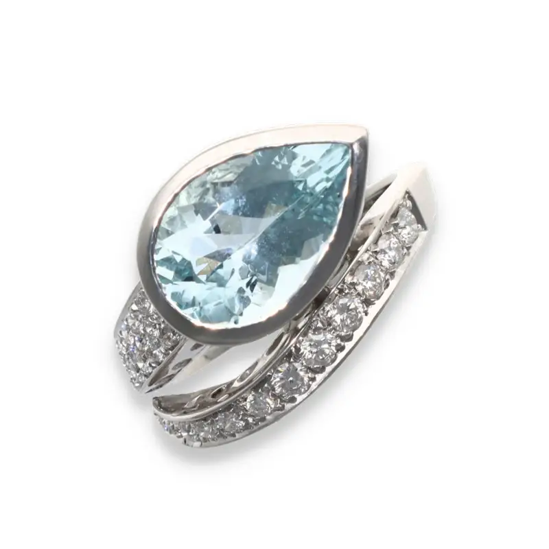 Anello in oro bianco 18kt a serpente con diamanti e acquamarina