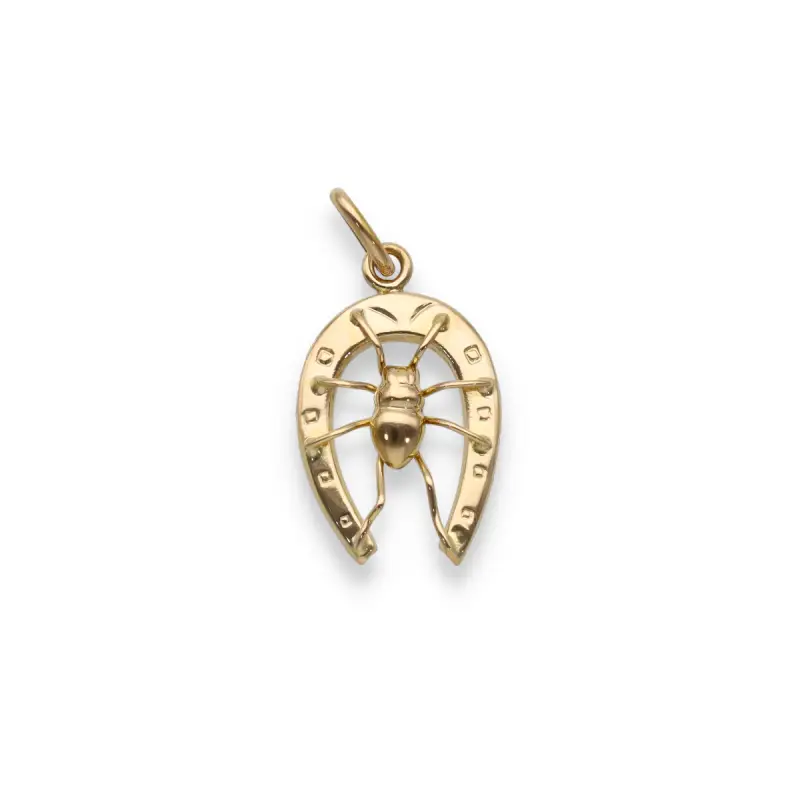Ciondolo in oro giallo 18kt a forma di staffa di cavallo e ragno