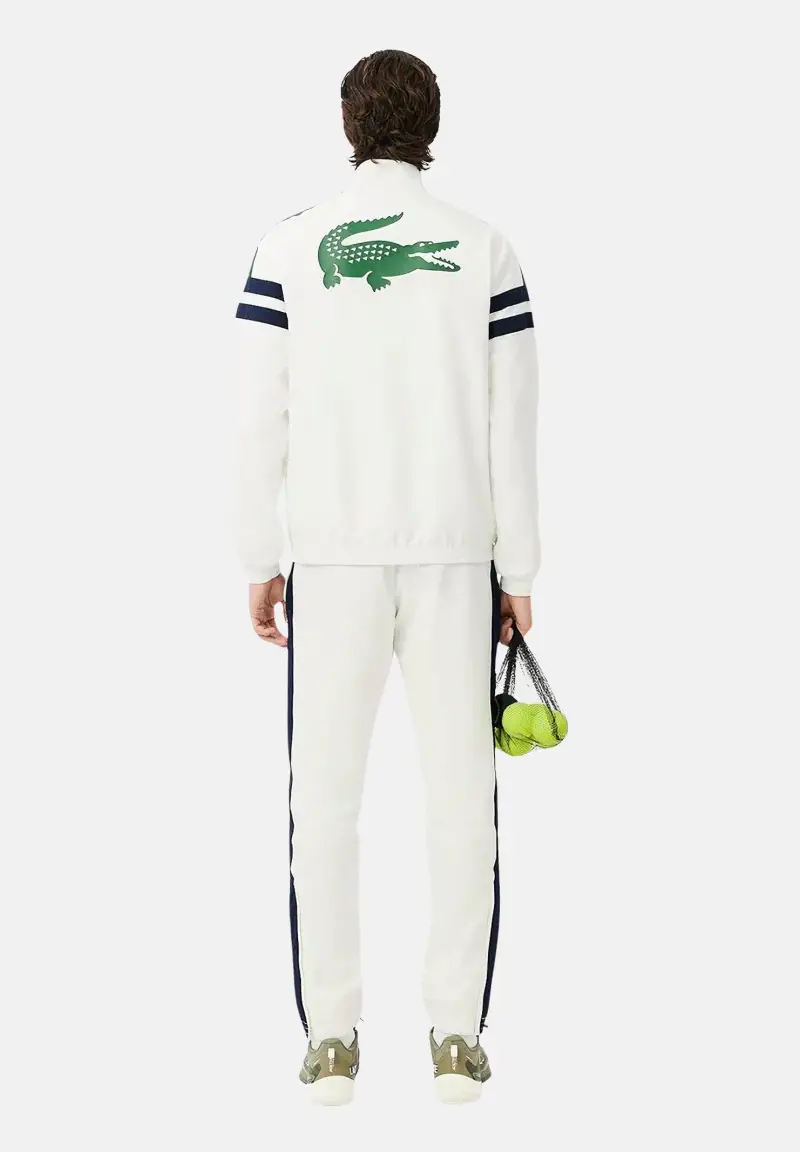 LA COSTE tuta da uomo in tessuto tecnico bianco con inserti verdi e due bande orizzontali blu navy sul petto miniatura 2