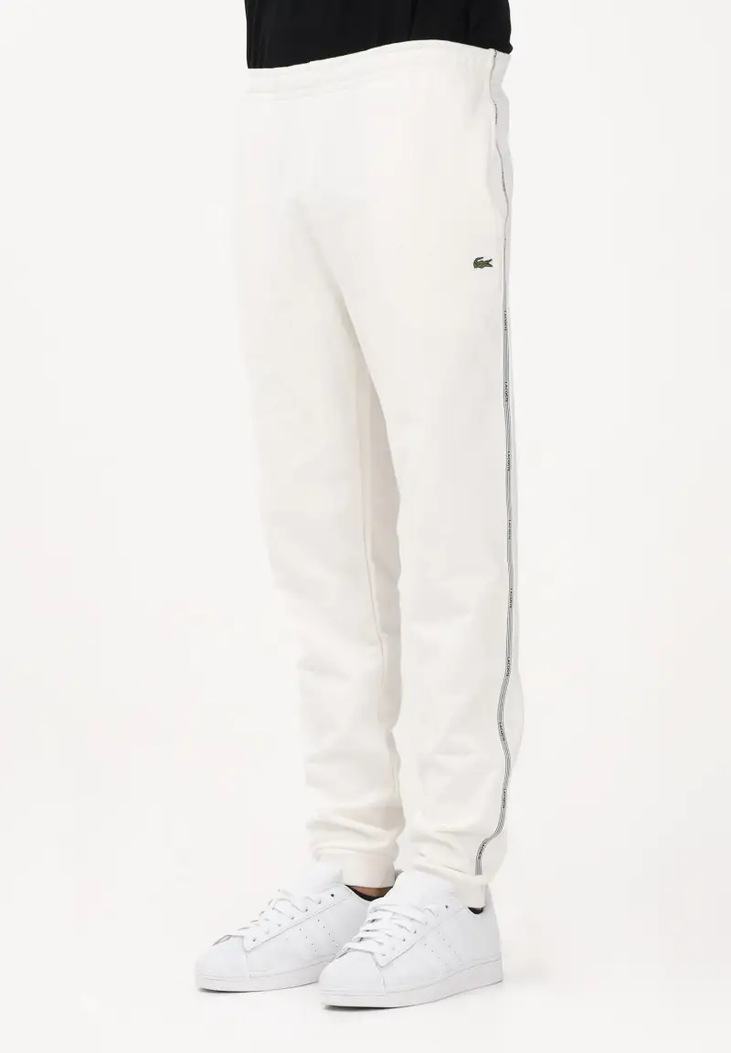 Pantalone sportivo bianco da uomo con rifiniture laterali logate