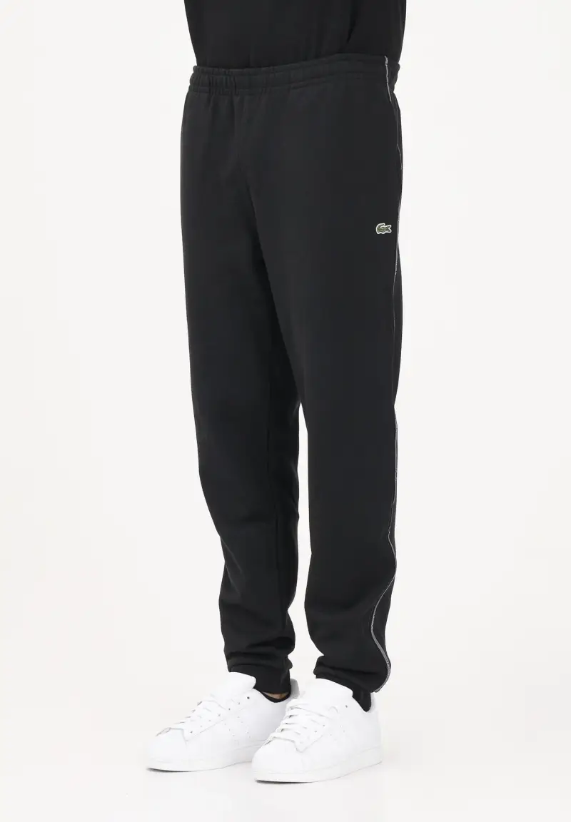 Pantalone sportivo nero da uomo con rifiniture laterali logate