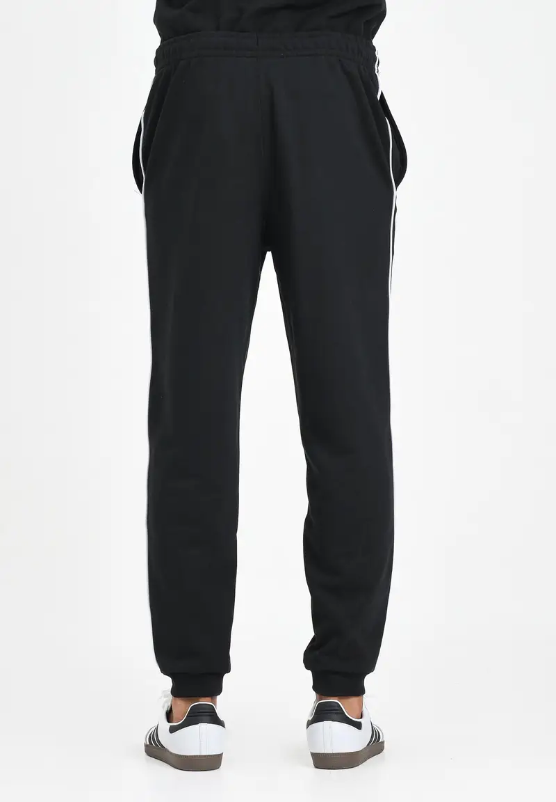 LACOSTE Pantalone sportivo nero per uomo e donna con riga logata miniatura 2