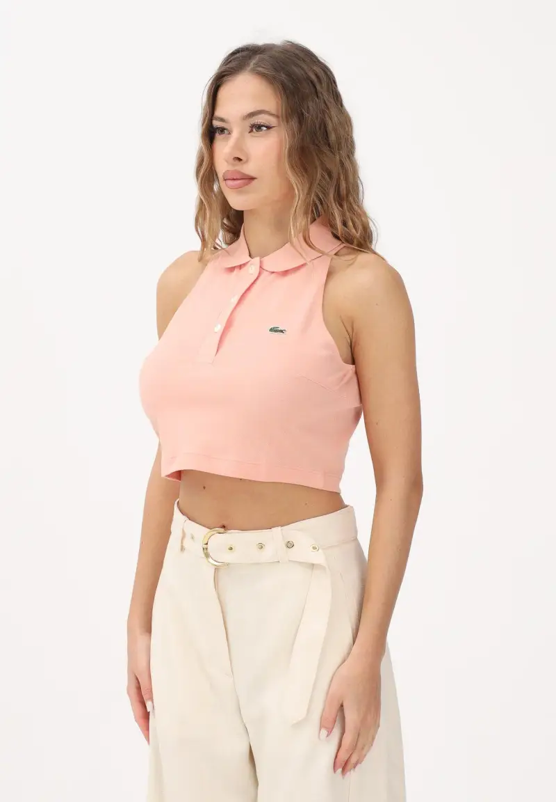 Polo crop rosa pesca da donna con logo