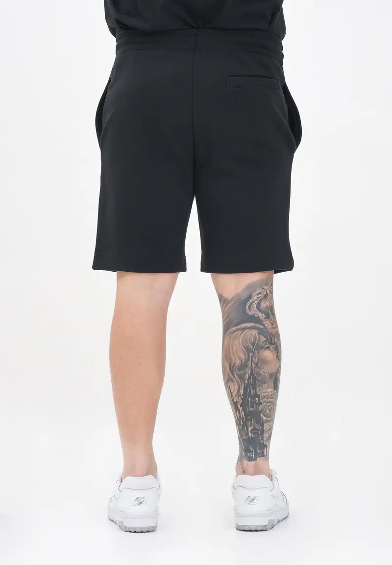 LACOSTE Shorts sportivo nero per uomo e donna con logo miniatura 2