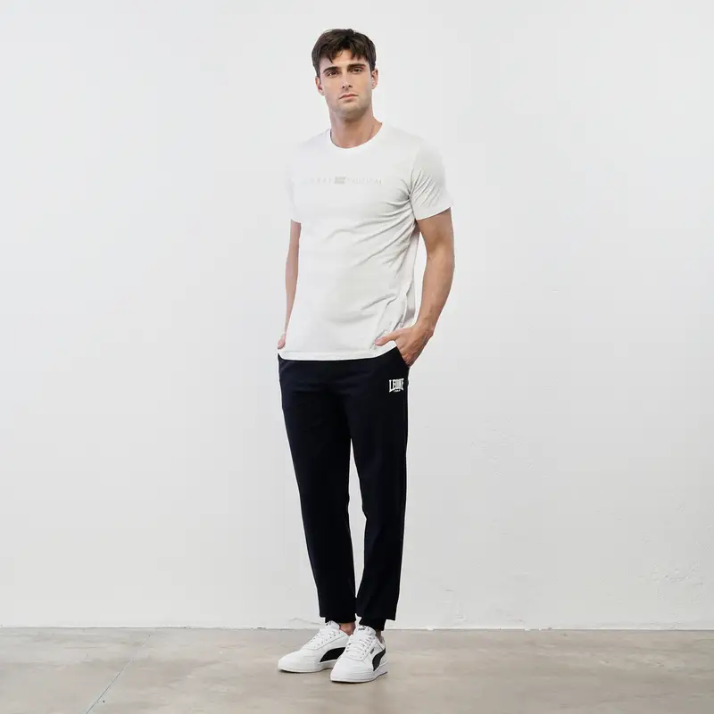 Pantaloni sportivi blu con tasche e polsini