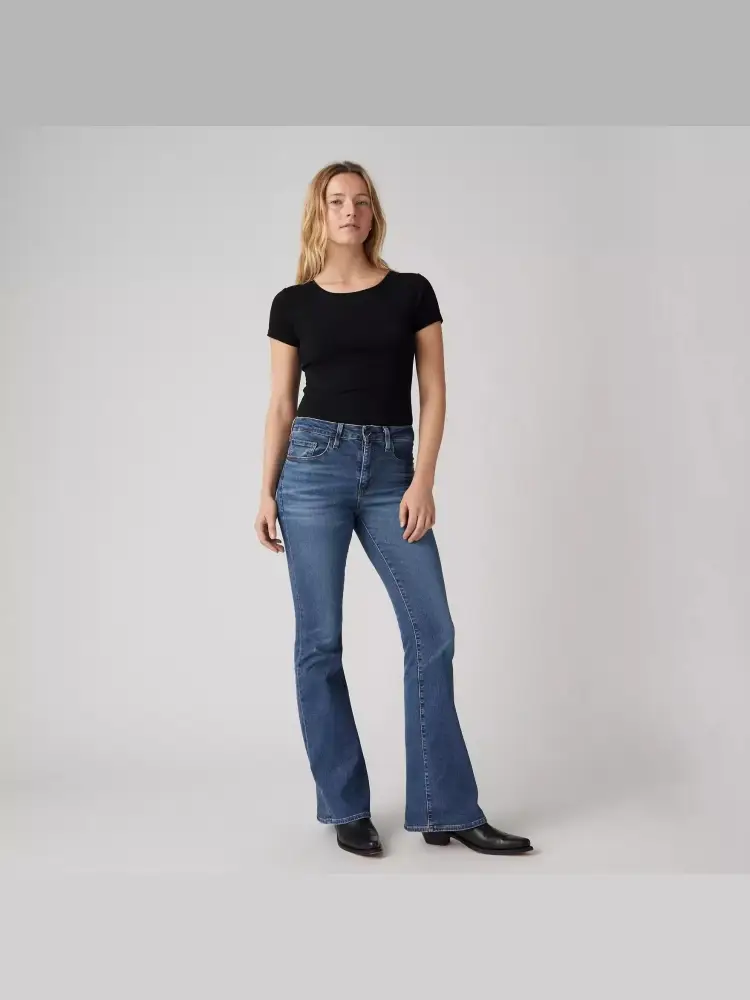 pantalone in deni scuro donna a zampa patch logo sul retro