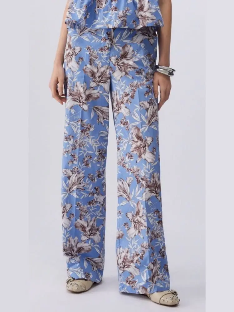 pantaloni donna azzurri con pattern floreale