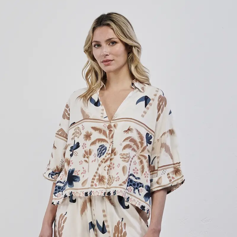 Blusa beige da donna con stampa tropical