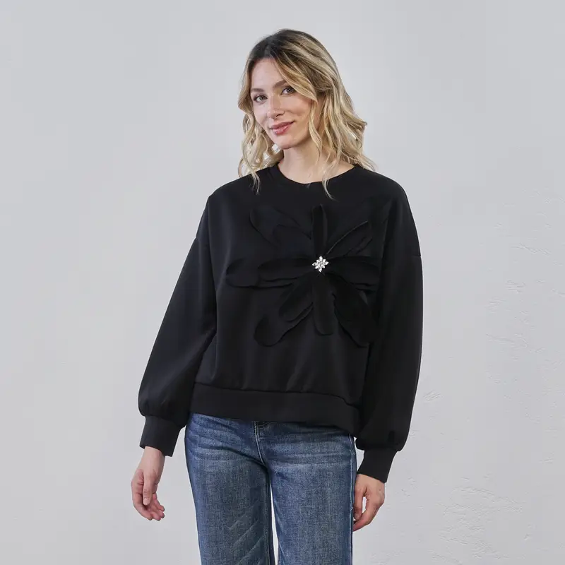 Felpa nera da donna con maxi fiore applicato