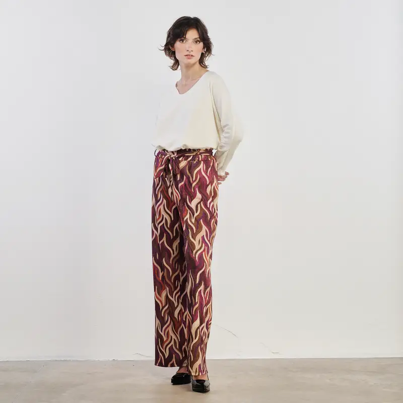 Pantaloni ampi lunghi con fantasia viola e beige