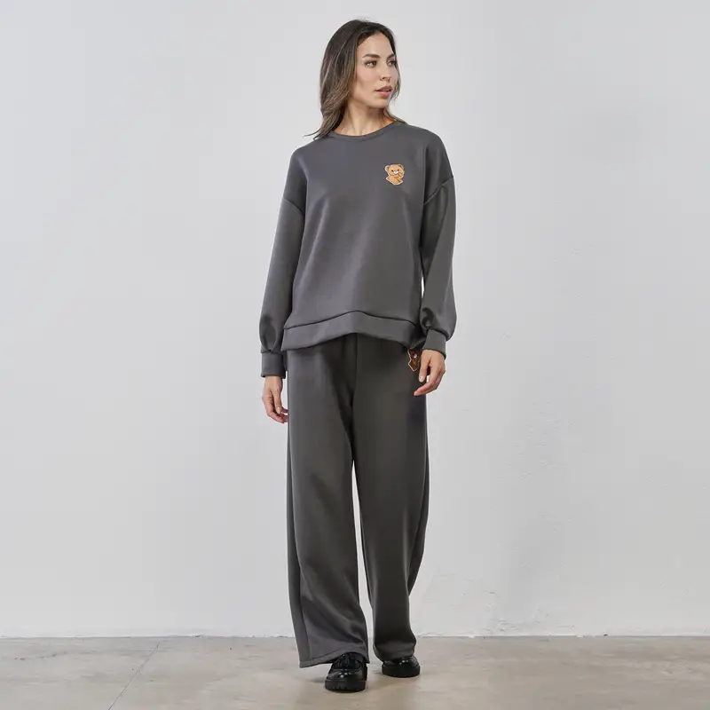 Pantaloni grigi lunghi da donna con dettaglio orsetto