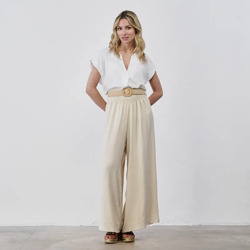 Pantaloni lunghi beige ampi da donna con cintura