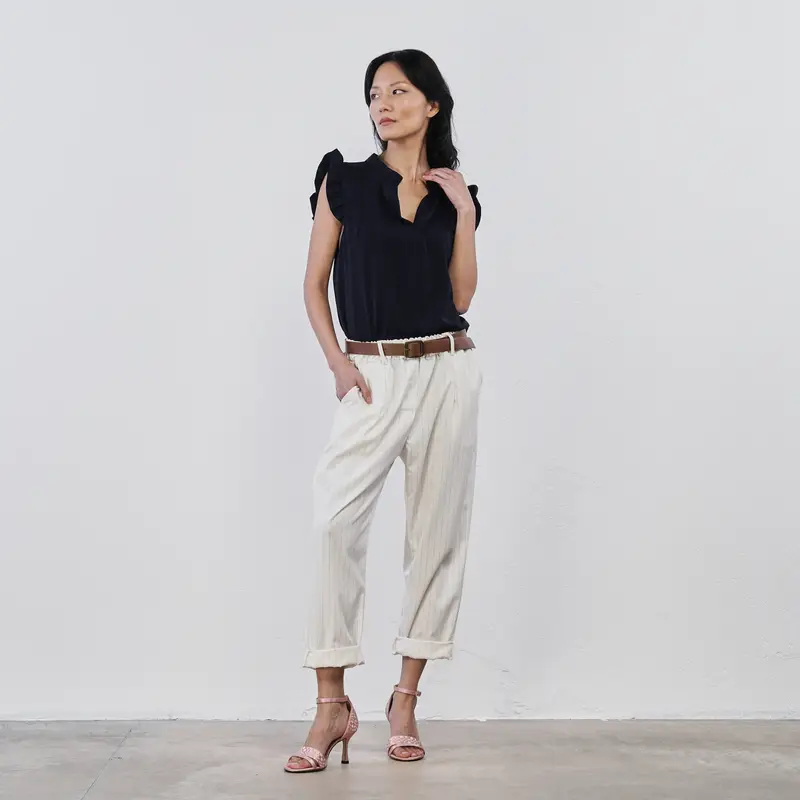 Pantaloni lunghi bianchi in fantasia gessata da donna con cintura