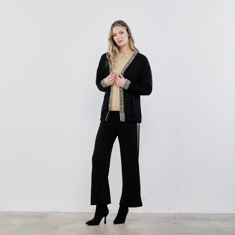 Pantaloni lunghi neri con banda laterale in fantasia animalier