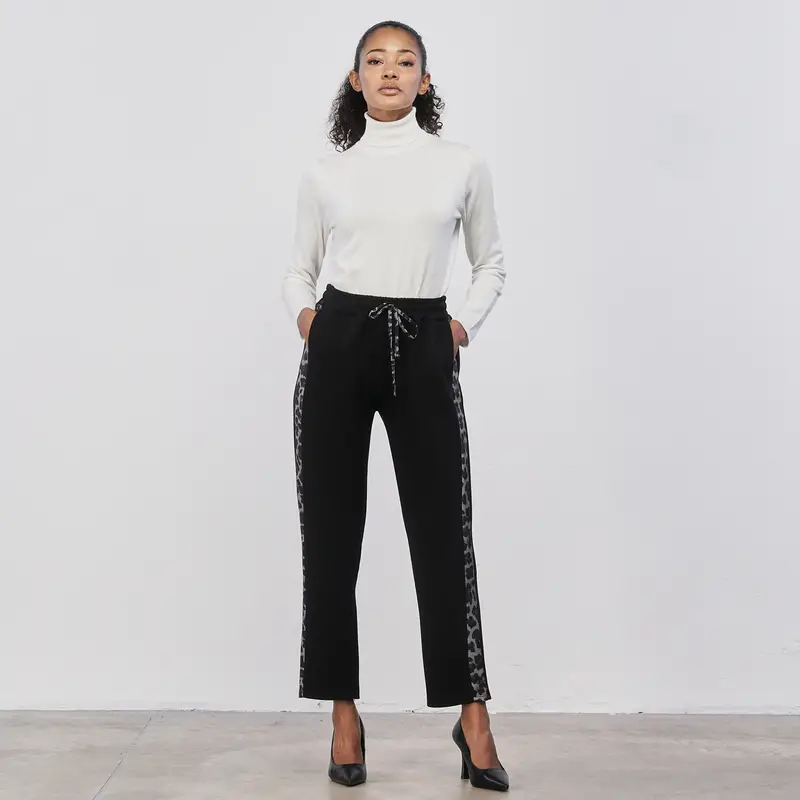 Pantaloni lunghi neri da donna con bande laterali fantasia animalier