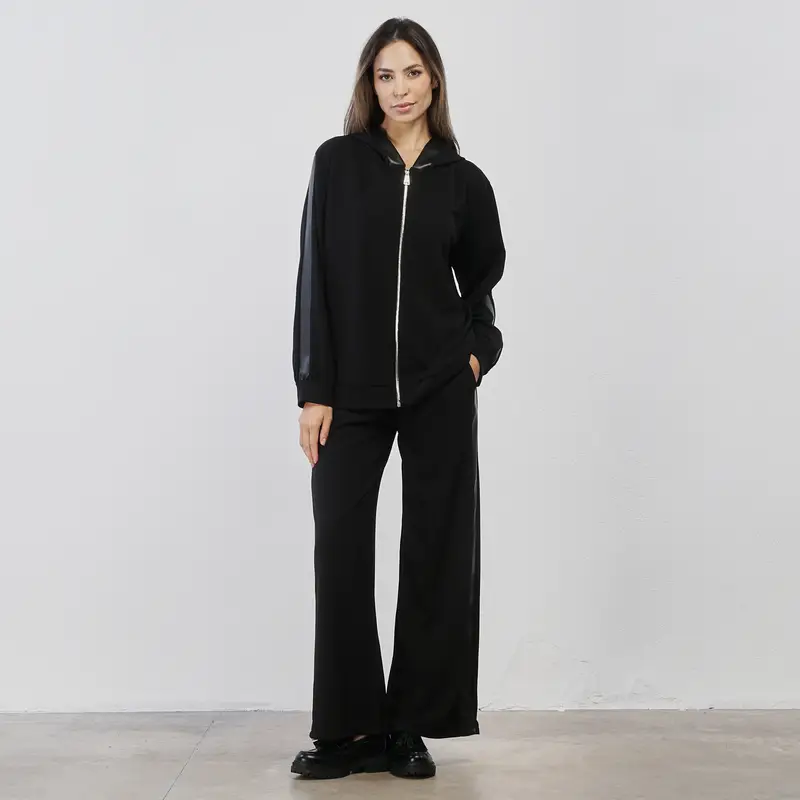 Pantaloni lunghi neri da donna con bande laterali in simil pelle